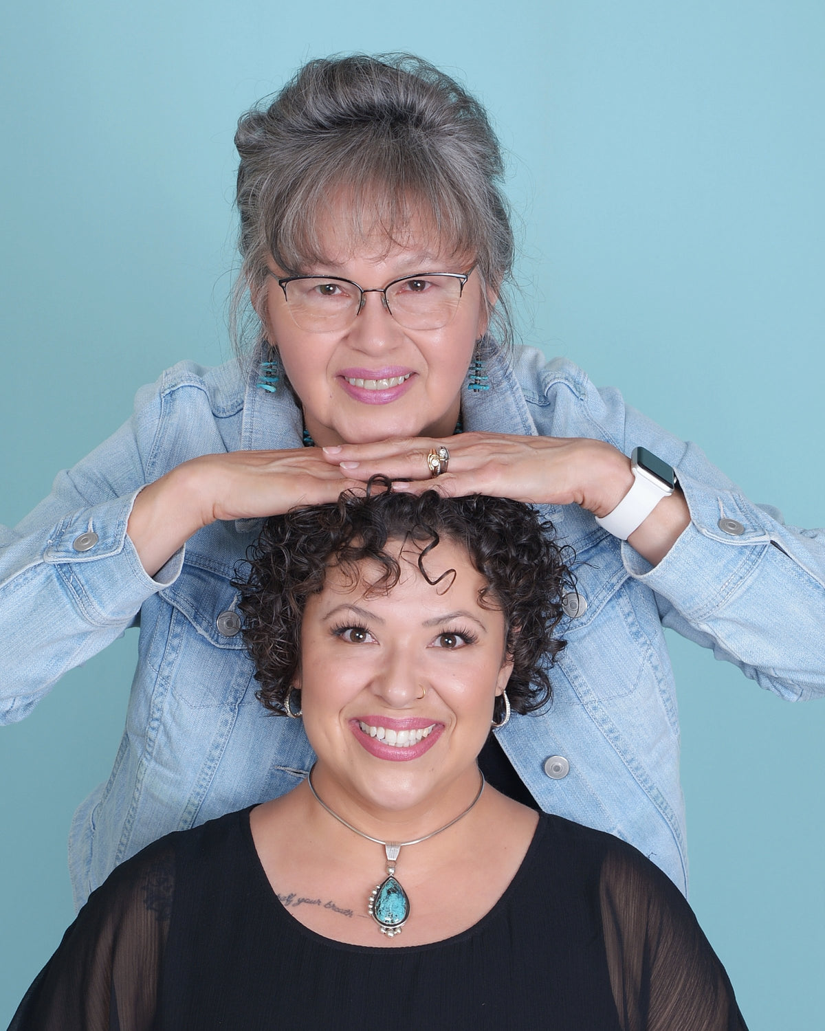 A headshot of Roberta and Chrystal